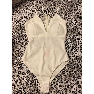 Off white body suit with lace back